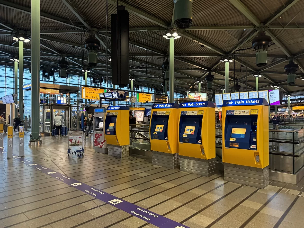 Buy train tickets from Schiphol airport to Amsterdam